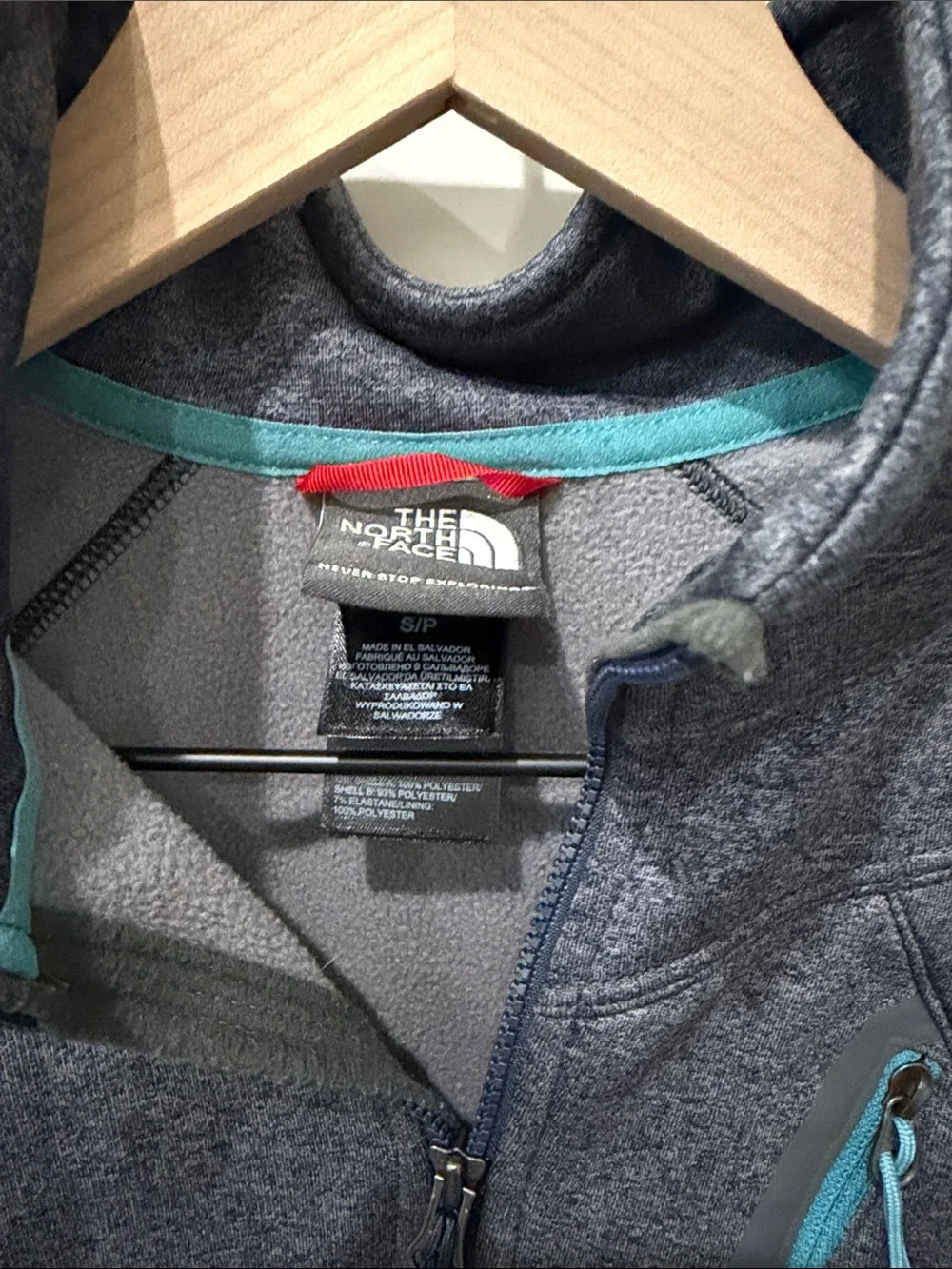 The North Face Unisex Quarter-Zip Pullover with Teal Accents
